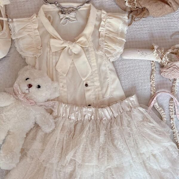 6262587528100040519 cream blouse and skirt set