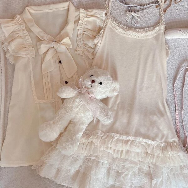 6262587528100040520 cream blouse and skirt set